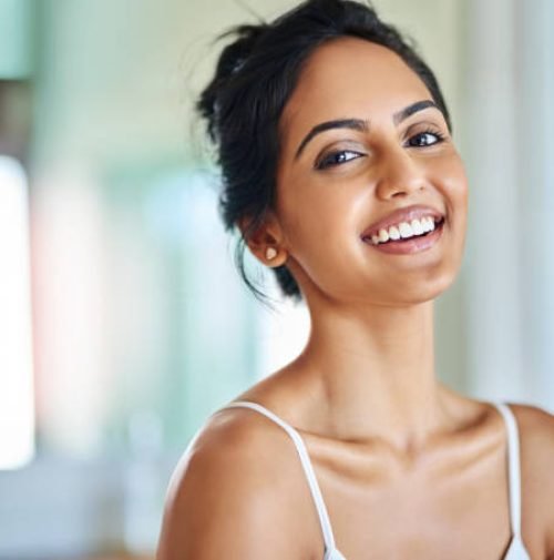 Portrait of an attractive young woman going through her morning routine Portrait of an attractive young woman going through her morning routine